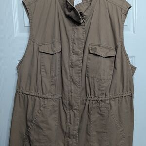 Woman Within Tan Sleeveless Vest